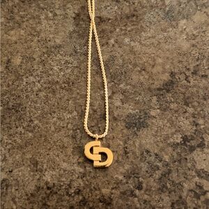 Dior Elegant Gold Necklace with Interlocking Pendant